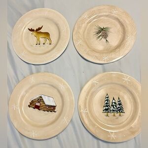 NIB Northwoods Collection 4 assorted salad / dessert plates. 8.25”
